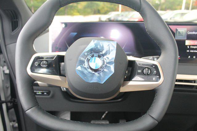 new 2026 BMW iX car, priced at $74,165