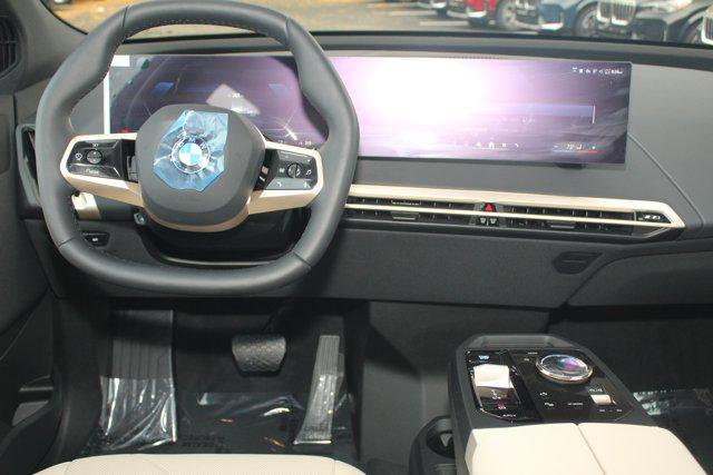new 2026 BMW iX car, priced at $74,165