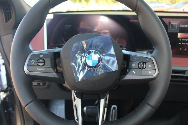 new 2026 BMW iX car, priced at $85,045