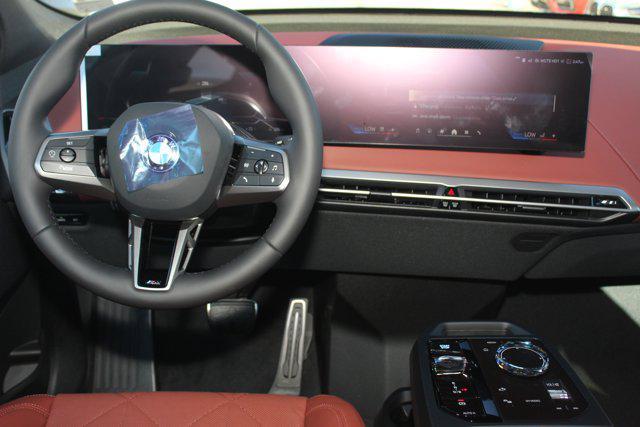 new 2026 BMW iX car, priced at $85,045