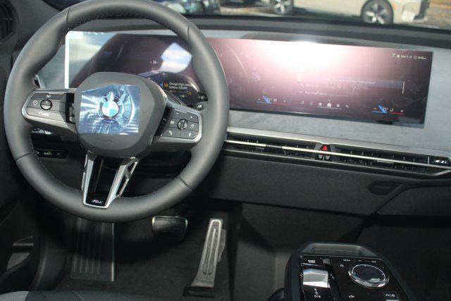 new 2026 BMW iX car, priced at $95,510