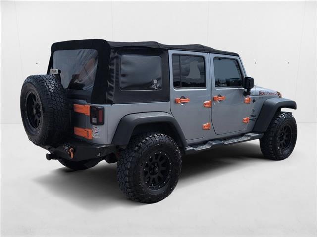 used 2015 Jeep Wrangler Unlimited car, priced at $12,999