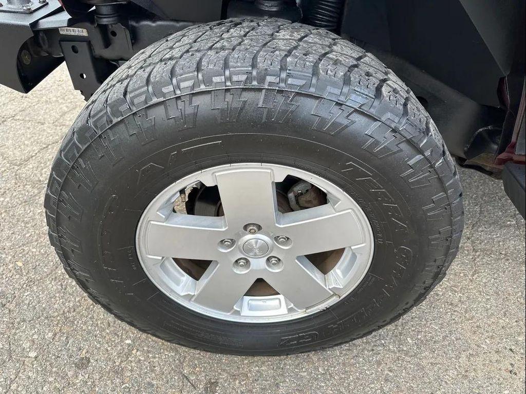 used 2011 Jeep Wrangler Unlimited car, priced at $13,995