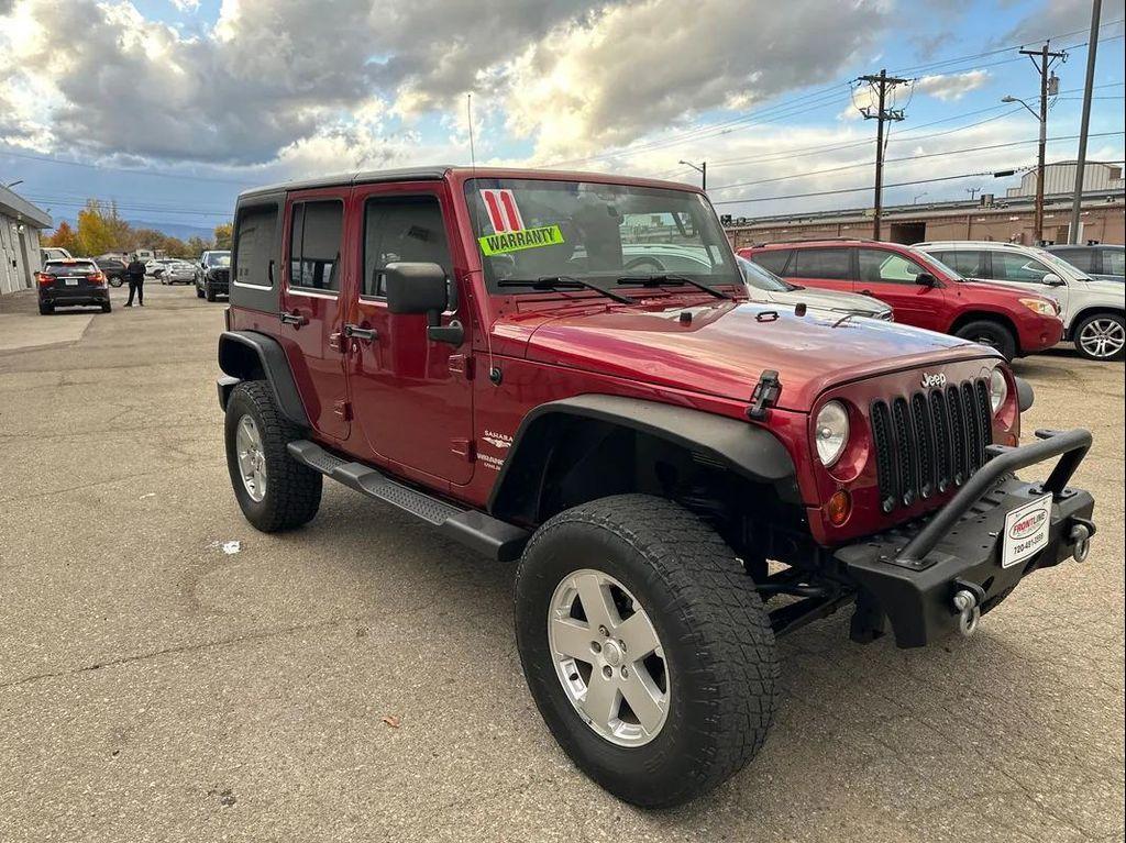 used 2011 Jeep Wrangler Unlimited car, priced at $13,995