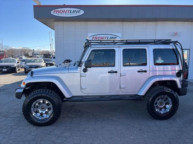 used 2011 Jeep Wrangler Unlimited car, priced at $14,995