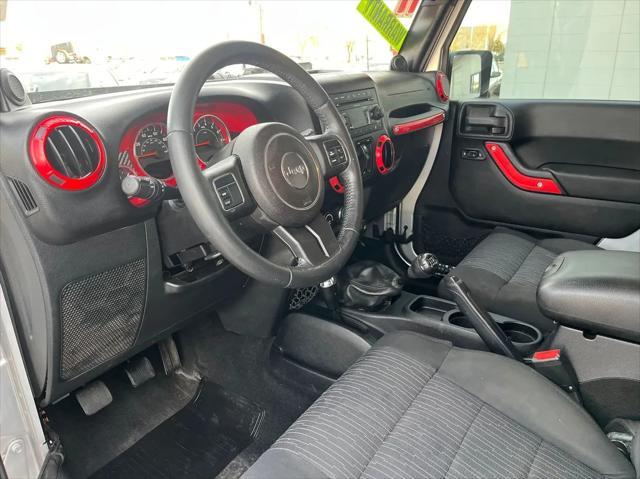 used 2011 Jeep Wrangler Unlimited car, priced at $14,995