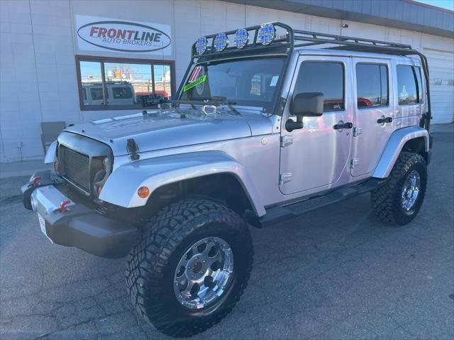 used 2011 Jeep Wrangler Unlimited car, priced at $14,995