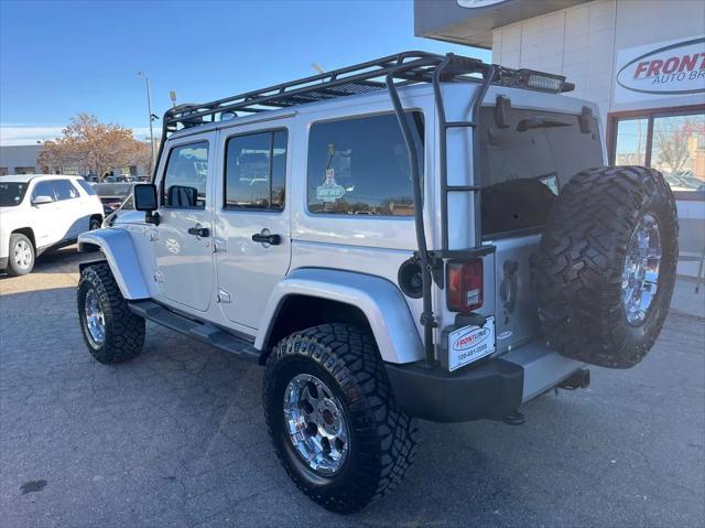 used 2011 Jeep Wrangler Unlimited car, priced at $14,995