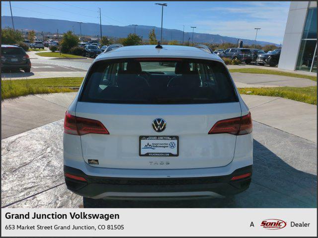 used 2023 Volkswagen Taos car, priced at $19,996