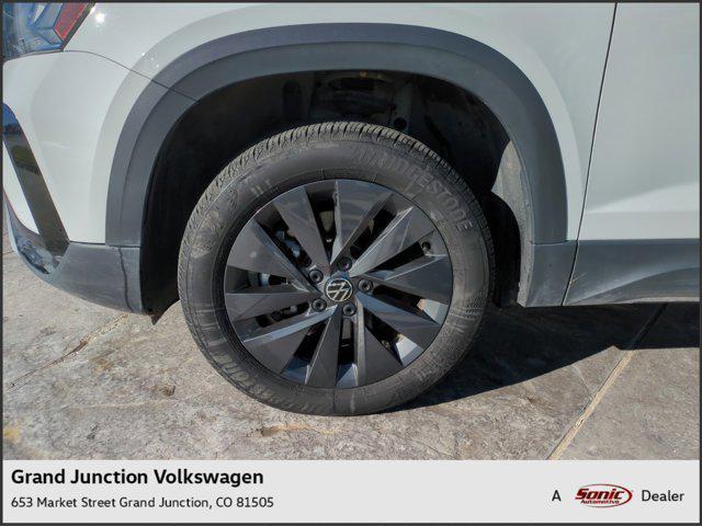 used 2023 Volkswagen Taos car, priced at $19,996