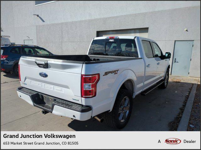 used 2018 Ford F-150 car, priced at $31,999