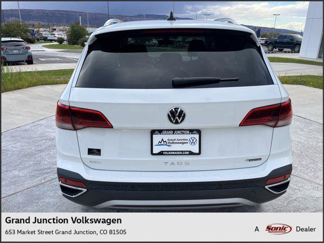 new 2024 Volkswagen Taos car, priced at $33,931