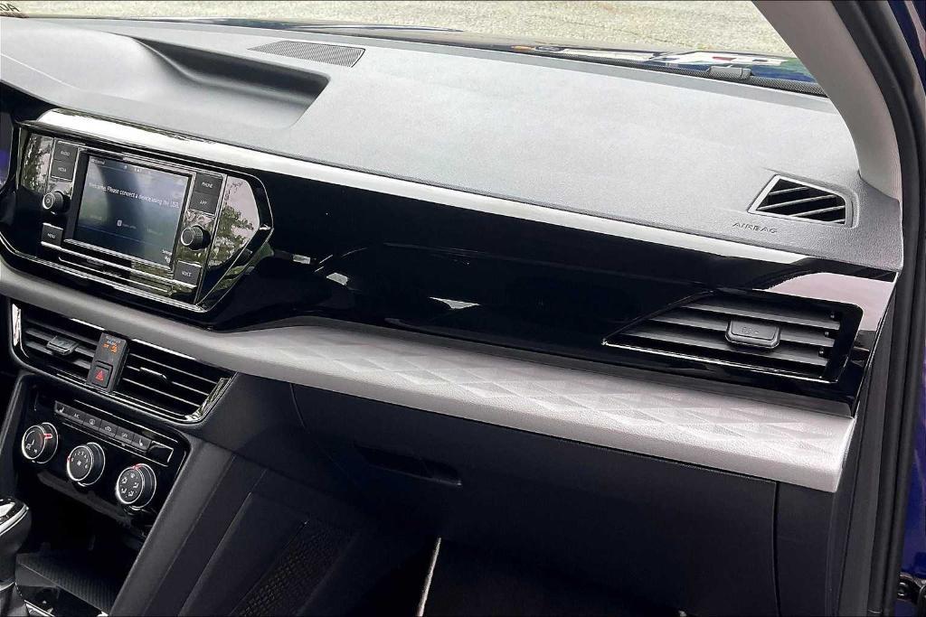 used 2023 Volkswagen Taos car, priced at $22,400