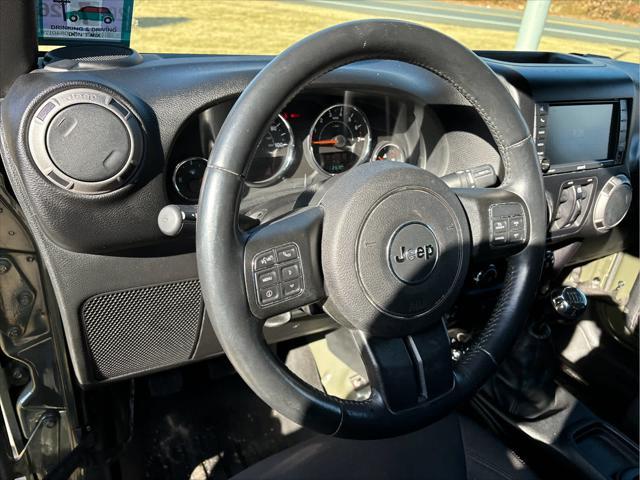 used 2015 Jeep Wrangler Unlimited car, priced at $19,235