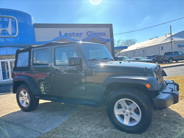 used 2015 Jeep Wrangler Unlimited car, priced at $19,235