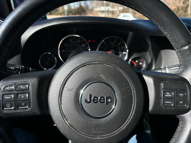 used 2015 Jeep Wrangler Unlimited car, priced at $19,235