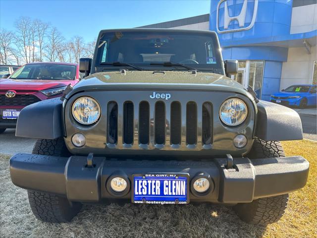 used 2015 Jeep Wrangler Unlimited car, priced at $19,235