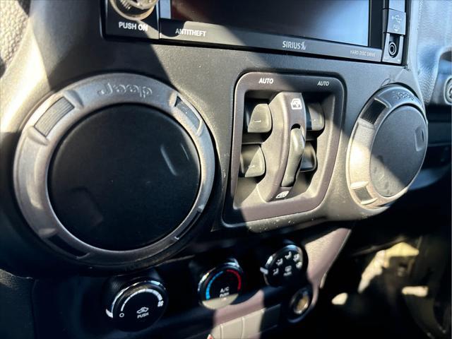 used 2015 Jeep Wrangler Unlimited car, priced at $19,235