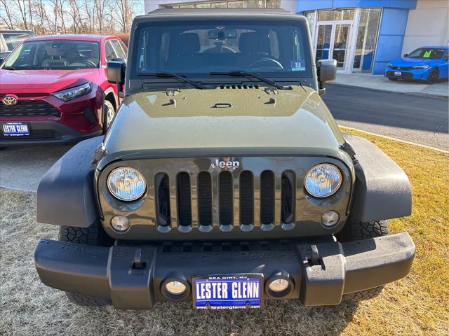 used 2015 Jeep Wrangler Unlimited car, priced at $19,235