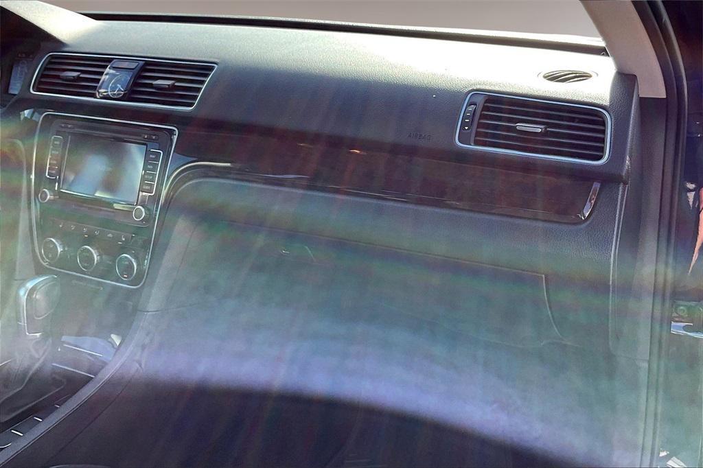 used 2015 Volkswagen Passat car, priced at $7,852