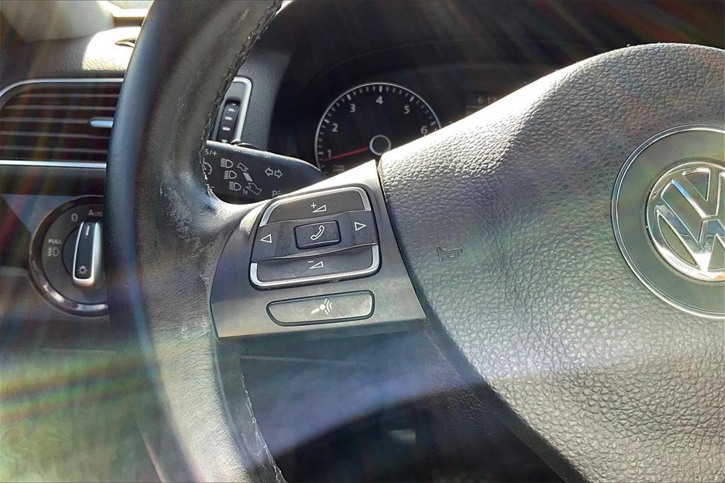 used 2015 Volkswagen Passat car, priced at $7,852