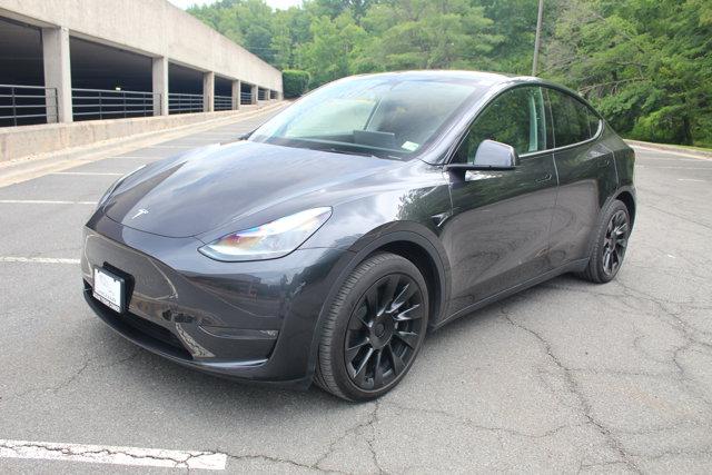 used 2024 Tesla Model Y car, priced at $35,615