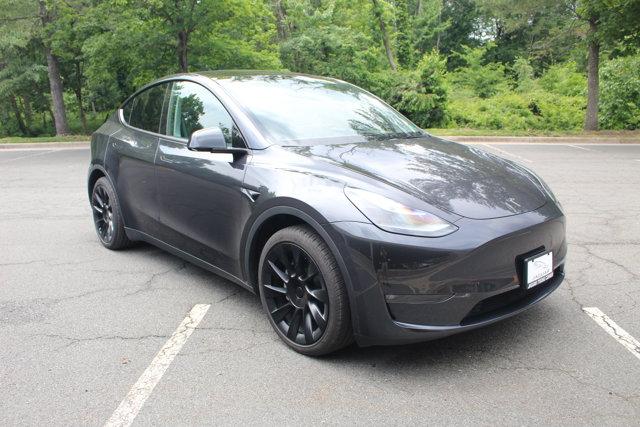 used 2024 Tesla Model Y car, priced at $35,615