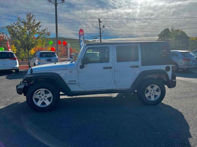 used 2017 Jeep Wrangler Unlimited car, priced at $23,924