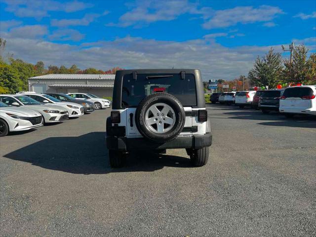 used 2017 Jeep Wrangler Unlimited car, priced at $23,924