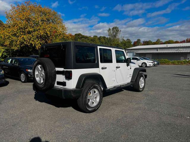 used 2017 Jeep Wrangler Unlimited car, priced at $23,924