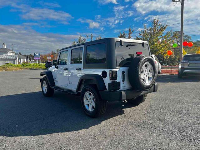 used 2017 Jeep Wrangler Unlimited car, priced at $23,924