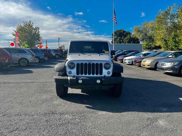 used 2017 Jeep Wrangler Unlimited car, priced at $23,924