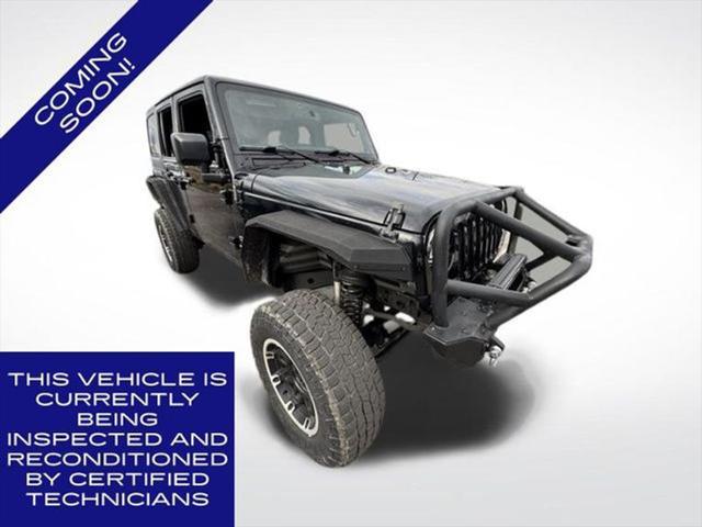 used 2015 Jeep Wrangler Unlimited car, priced at $21,980