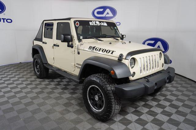 used 2011 Jeep Wrangler Unlimited car, priced at $16,995