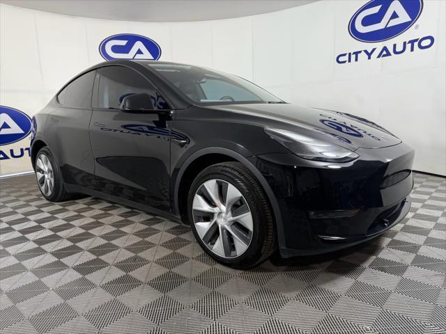used 2023 Tesla Model Y car, priced at $30,800