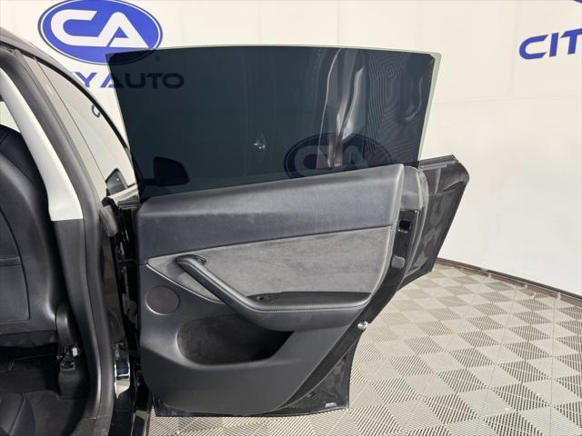 used 2023 Tesla Model Y car, priced at $30,800