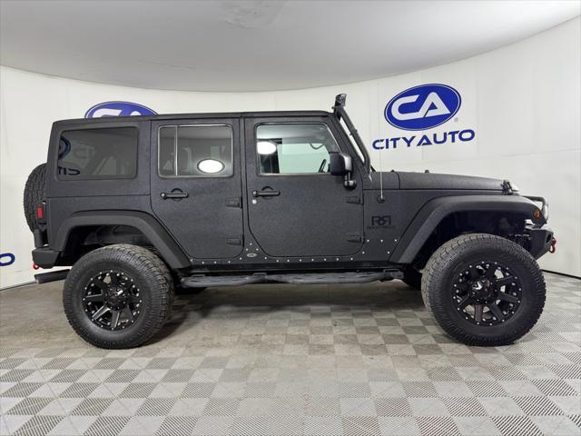 used 2015 Jeep Wrangler Unlimited car, priced at $21,995