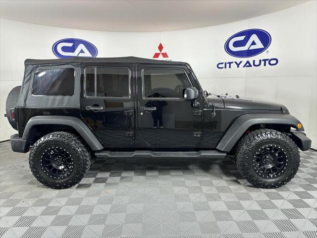 used 2014 Jeep Wrangler Unlimited car, priced at $17,880