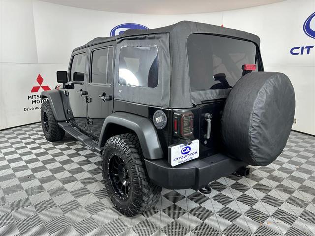 used 2014 Jeep Wrangler Unlimited car, priced at $17,880