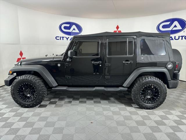 used 2014 Jeep Wrangler Unlimited car, priced at $17,880