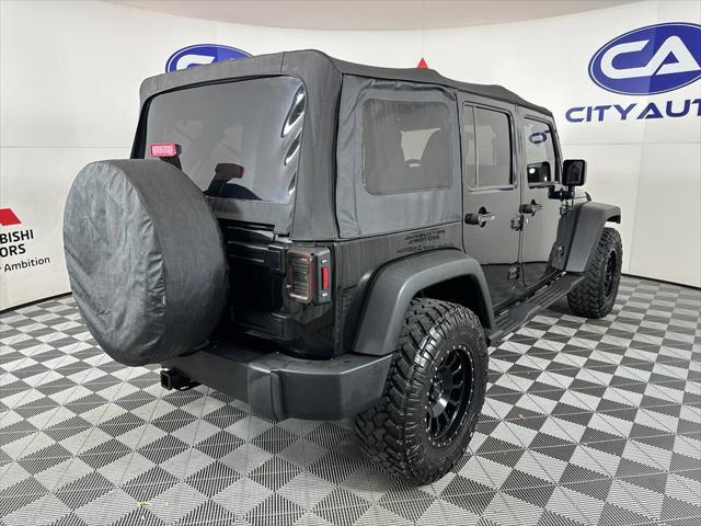 used 2014 Jeep Wrangler Unlimited car, priced at $17,880