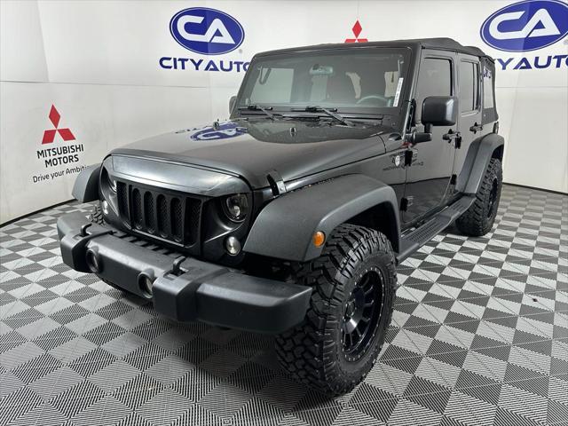 used 2014 Jeep Wrangler Unlimited car, priced at $17,880