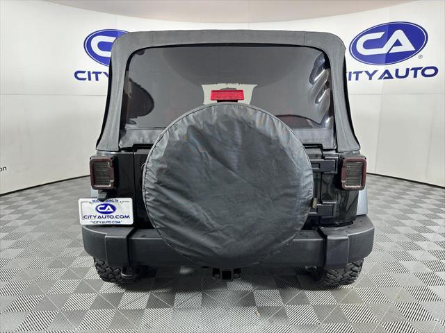 used 2014 Jeep Wrangler Unlimited car, priced at $17,880