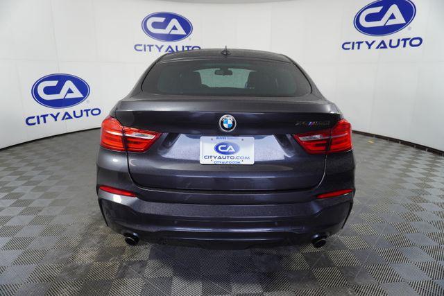 used 2018 BMW X4 car, priced at $29,727