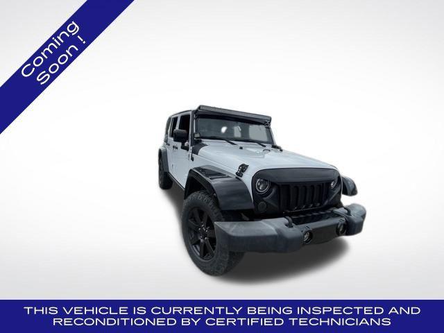 used 2014 Jeep Wrangler Unlimited car, priced at $21,275