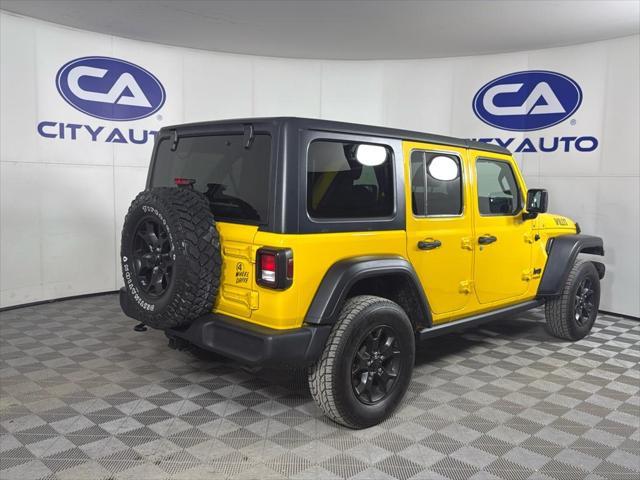 used 2021 Jeep Wrangler car, priced at $27,885