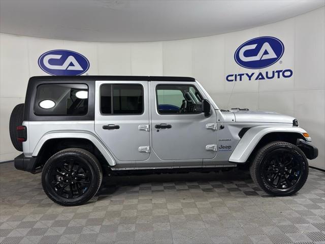 used 2023 Jeep Wrangler 4xe car, priced at $32,895