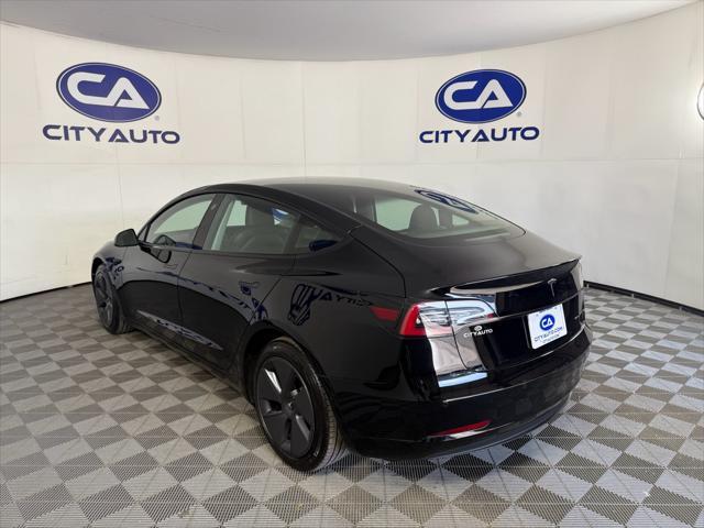 used 2022 Tesla Model 3 car, priced at $30,000