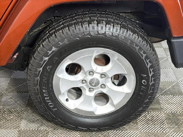 used 2014 Jeep Wrangler Unlimited car, priced at $18,986