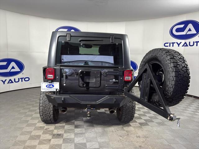 used 2014 Jeep Wrangler Unlimited car, priced at $17,500